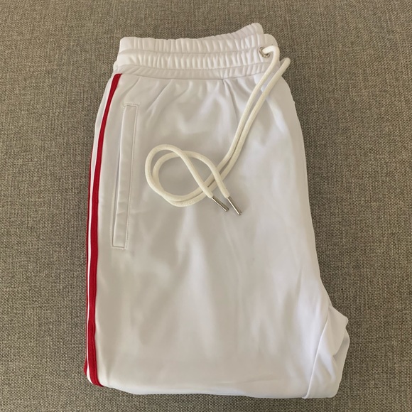 red and white striped track pants